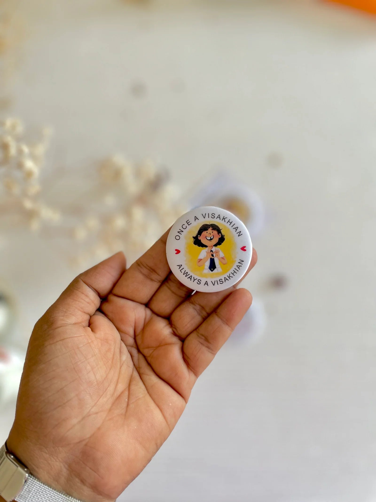 VV Schoolgirl pin badge